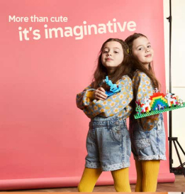 Lego ad of young girls playing with Lego